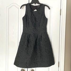 Floral Brocade Fit and Flare dress with Cut Out